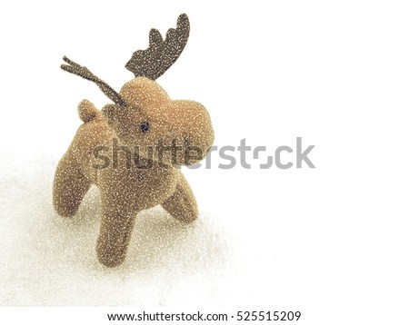 Vintage looking High key picture of Christmas moose deer in snow