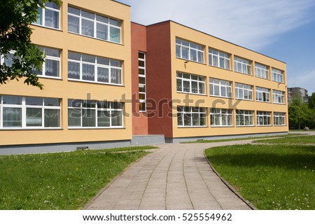 School building. Exterior view of school. Royalty-Free Stock Photo #525554962