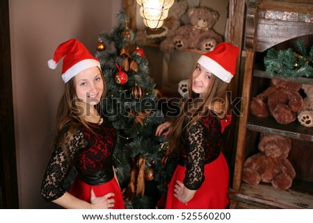 twins in a Christmas toy shop