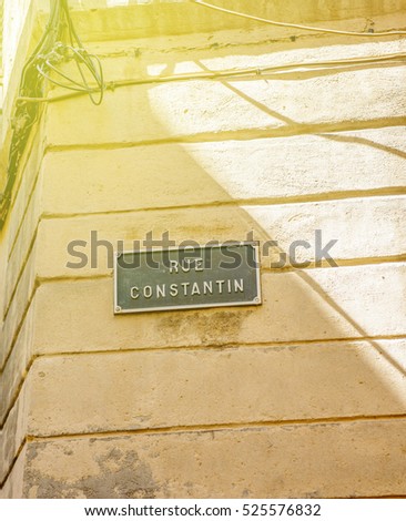 Sunny day over Rue Constantion or Constantin street sign seen in Aix-en-Provence France