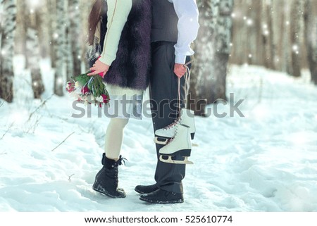 Lovers of winter with skates