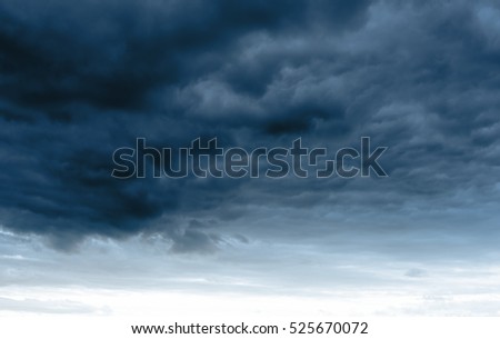 Dramatic rainy sky and dark clouds. Hurricane wind