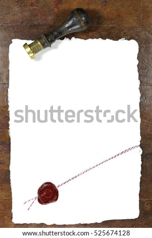 handmade paper with wax seal  on wooden table