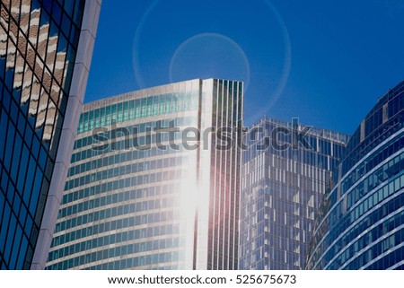 tops of skyscrapers in the business district, lens flare effect