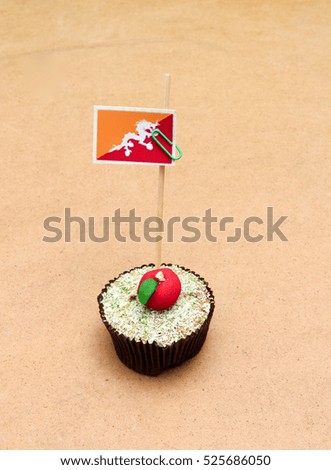 picture of a flag on a apple cupcake , bhutan