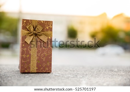 Christmas gift box - Vintage effect style pictures.gift box on white table. colorful gifts box.Golden gift boxes on abstract background.Christmas miracle, magic gift box.