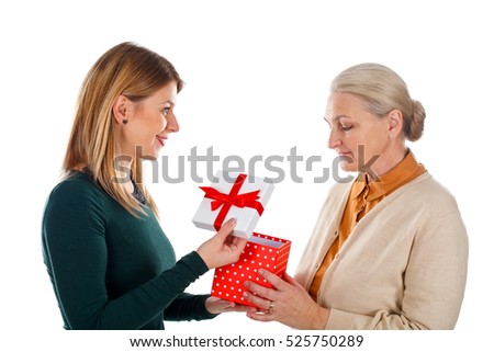 Picture of a beautiful young girl spending Christmas time with her mother