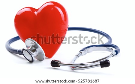 Red heart and a stethoscope on desk Royalty-Free Stock Photo #525781687