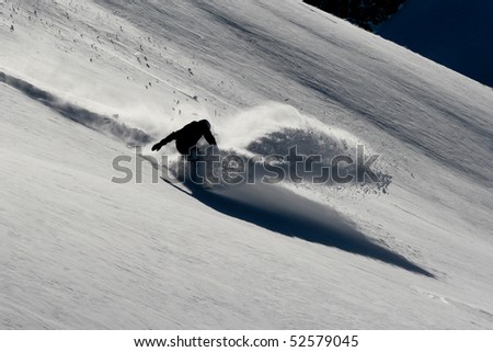 powderturn on snowboard