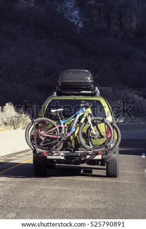Family Vacation Vehicle with Bikes on Rack 