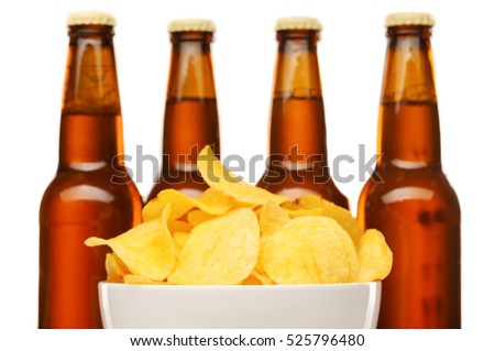  bottle of golden Beer with Potato Chips isolated on white 