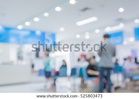 Blurred image of people waiting to see a doctor in hospital. For Royalty-Free Stock Photo #525803473