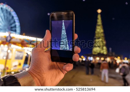 Taking photo of Christmas fair in Hyde park in 2016, London