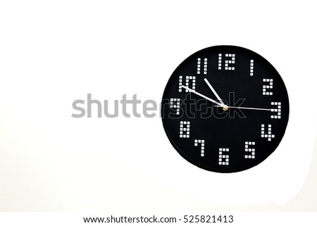 A black clock isolated on white background.