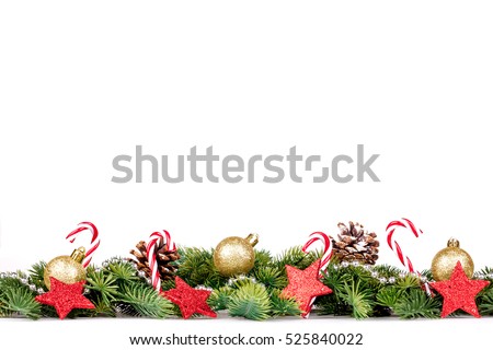 Christmas Border - tree branches with golden balls, candy and big star isolated on white