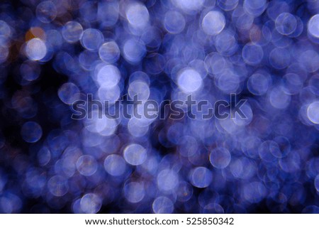 Purple  bokeh background created by neon lights.