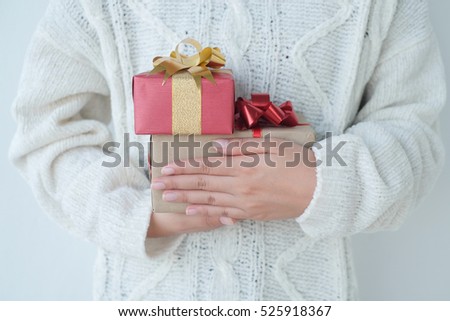 Close up soft focus on woman holding gift box package concept.