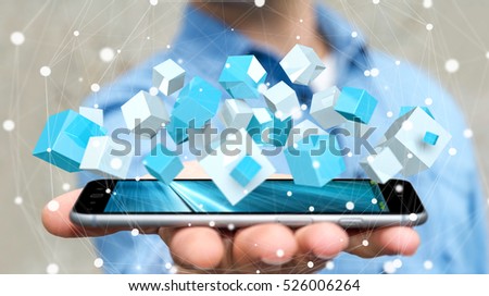 Businessman on blurred background holding flying blue shiny cube 3D rendering