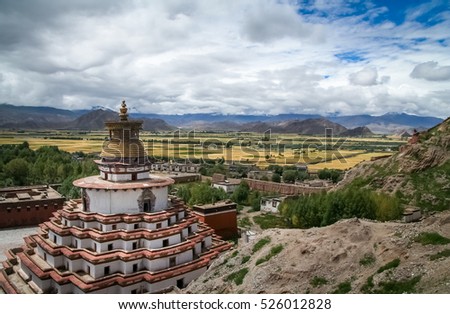 The Buddhist Kumbum chorten, Palkhor Monastery and the aerial view of the walled Gyantse town in the Tibet Autonomous Region of China