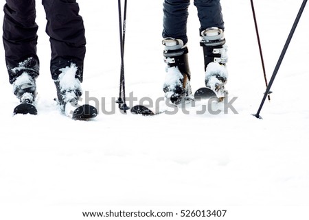 Close up shooting of people skiing using specific equipment