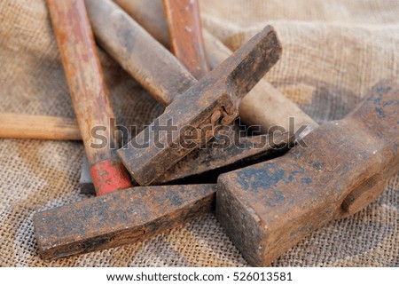 group of old hammer - rusty tools