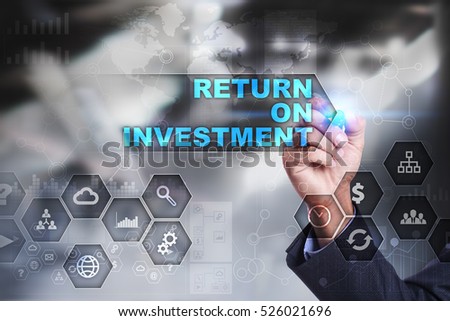 Businessman is drawing on virtual screen. return on investment concept.