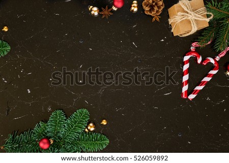 Christmas flat lay styled scene - mockup with red and golden decorations on black background
