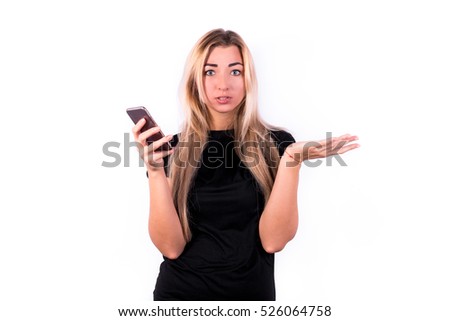 Young blond woman holding a phone. The modern concept. Technology and Communication. Isolated 