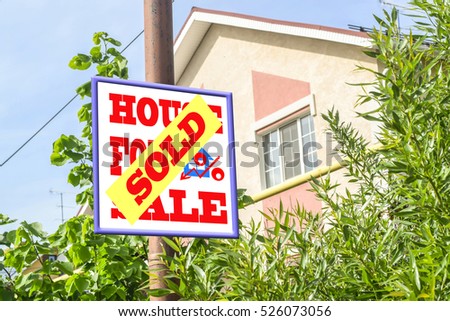 A Billboard advertising the sale of real estate . The concept of changes in housing prices