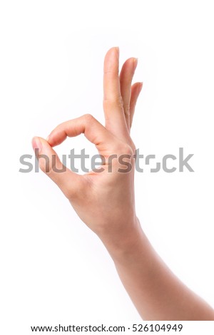 woman hand pointing up okay, yes, accepting hand sign to the side, studio isolated