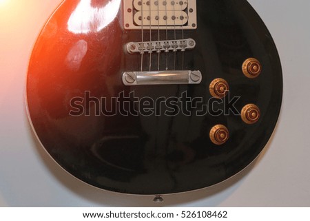 Close-up of vintage electric jazz guitar 
