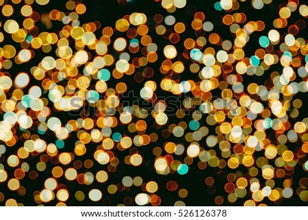 Christmas wallpaper decorations concept.Sparkle circle lit celebrations display.colored abstract blurred light background layout design.Festive elegant abstract background