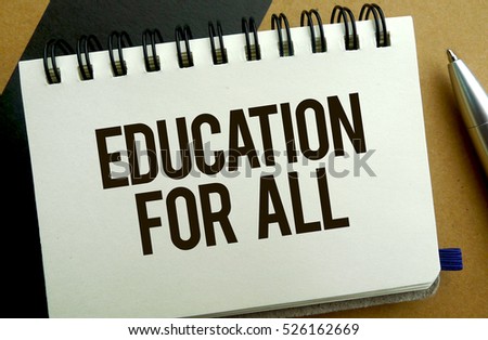 Education for all memo written on a notebook with pen