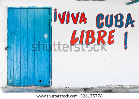 Glory Free Cuba! Inspiring the inscription on the wall of the house. 