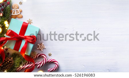 Christmas holidays composition on white wooden background with Christmas tree decoration and copy space for your text
