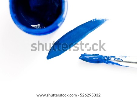 Blot, brushstrokes of blue paint, brush