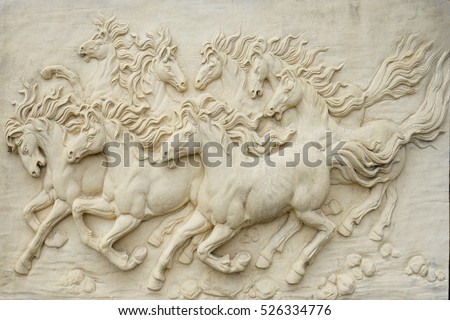 Sand stone sculpture brick wall of herd horse run background, low key black and white, high contrast and hard lighting tone