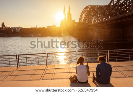 romantic couple spending their vacation in Cologne, Germany Royalty-Free Stock Photo #526349134