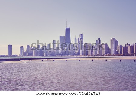 Retro toned photo of Chicago city downtown skyline, USA.