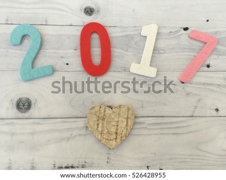 2017 wooden date. New year 2017. New year backgorund on wooden background.