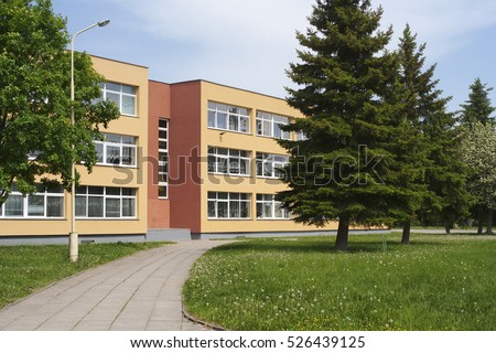 School building. Exterior view of school.

 Royalty-Free Stock Photo #526439125