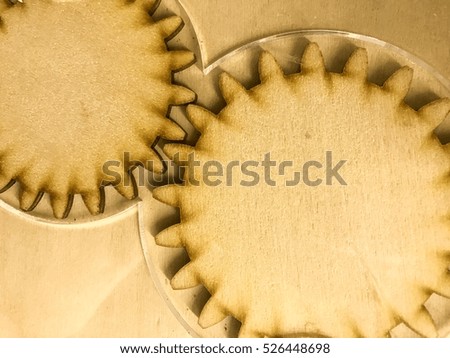 Two wooden gears close up view background wallpaper. Time to do. Gears of the clock