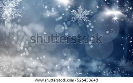 Magic holiday abstract glitter background with blinking stars and falling snowflakes. Blurred bokeh of Christmas lights.

