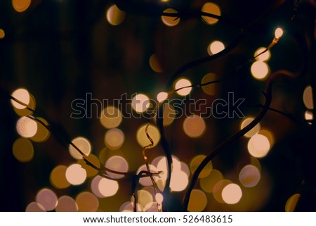 Christmas background. Festive abstract background with bokeh defocused lights and stars
