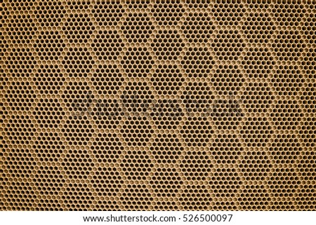 Plastic grille in a honeycomb. Grid of audio amplifier background. 