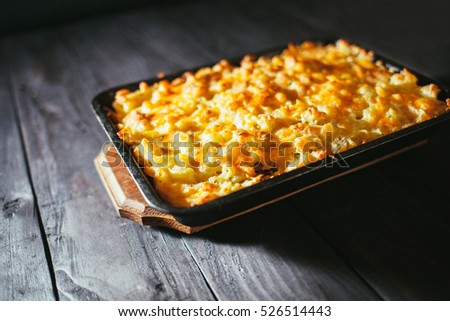 Casserole of macaroni and cheese pan
 Royalty-Free Stock Photo #526514443