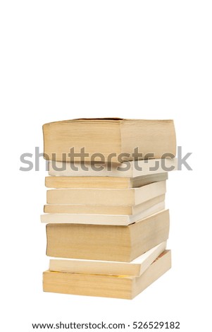 Stack of old paperback books isolated with copy space