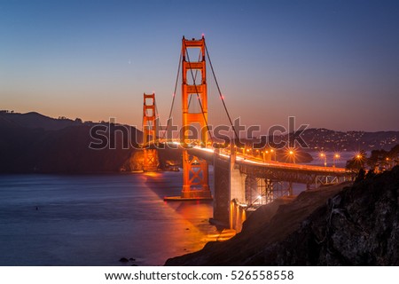 Sunset over Golden Gate Bridge in San Francisco, California, USA Royalty-Free Stock Photo #526558558