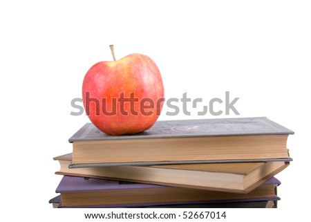 Apple and books isolated on a white background