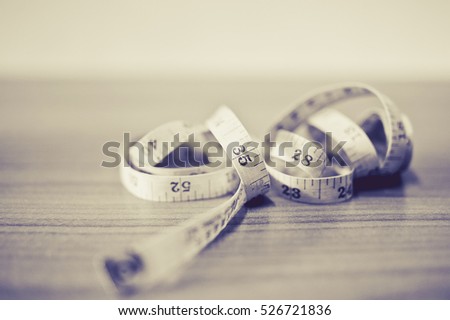 measurement of length and volume on a white background. Royalty-Free Stock Photo #526721836